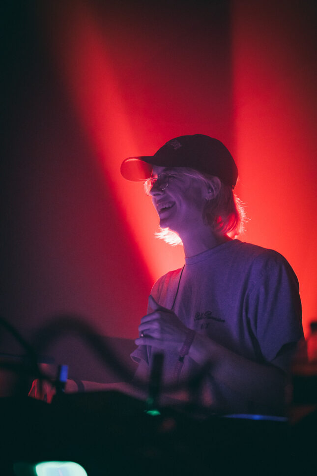 Avalon Emerson smiles at the crowd while playing the main stage of Sustain-Release.