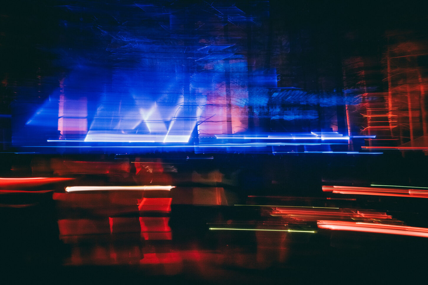 A long exposure photograph with streaking lights at the Sustain-Release Grove.